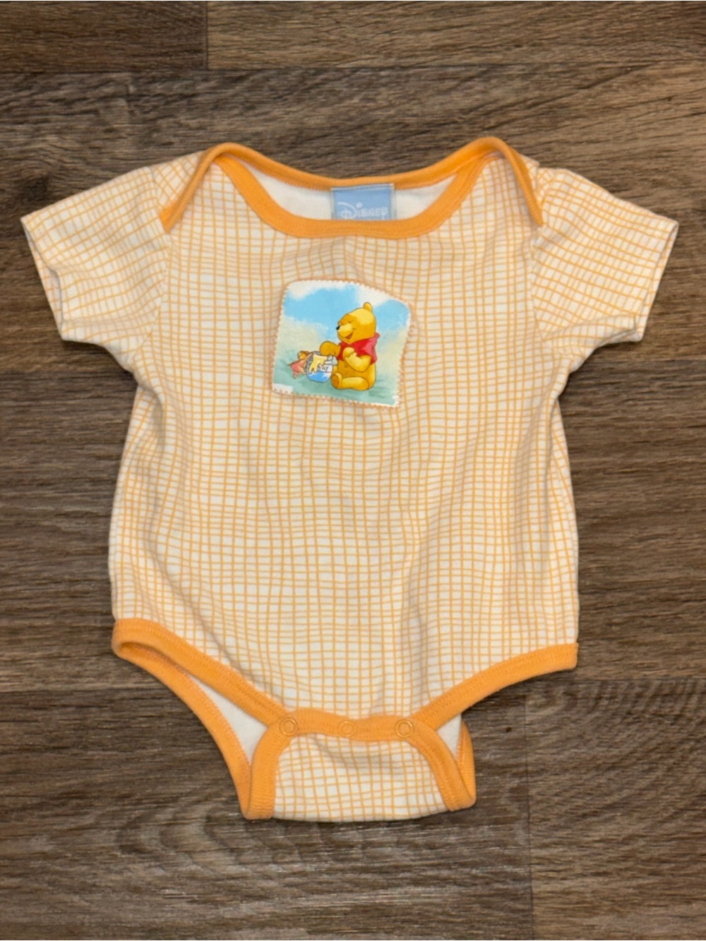 Disney Yellow & Orange Winnie the Pooh One-Piece Bodysuit